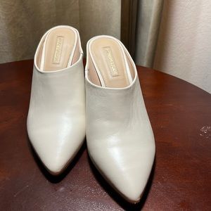 Almost new Antonio Melani mules size 7 .